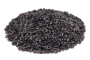 Uncooked black rice grains – Chak-hao, Manipur black rice